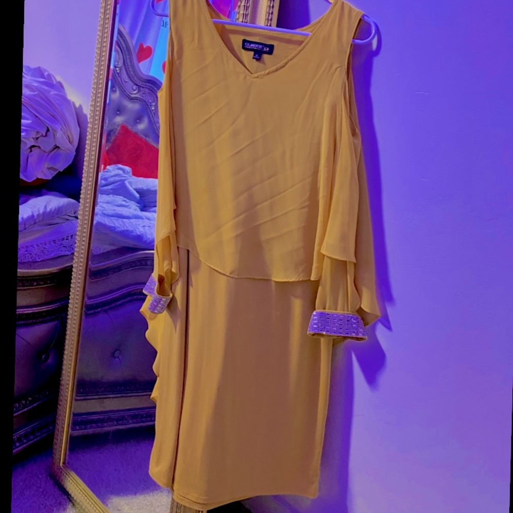 yellow flowy dress with cute sparkles on sleeves!